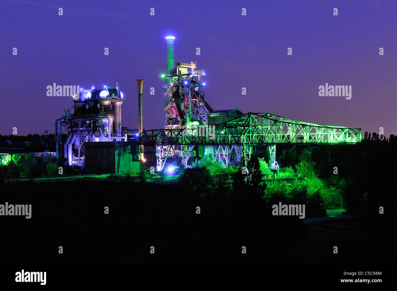 Night shot of Landschaftspark Nord, old illuminated industrial ruins in Duisburg, Germany Stock Photo