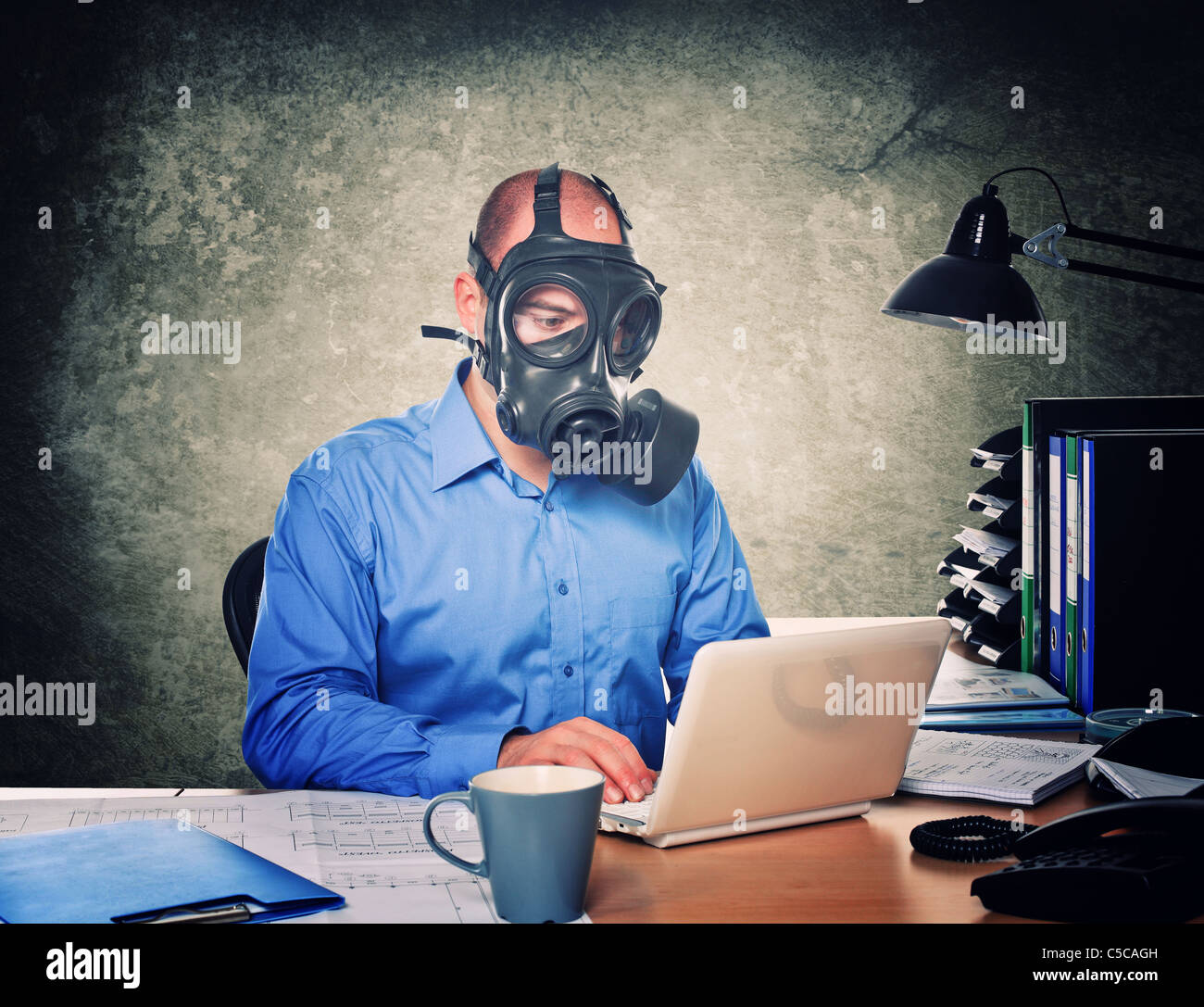 man wearing gas mask work with laptop Stock Photo - Alamy