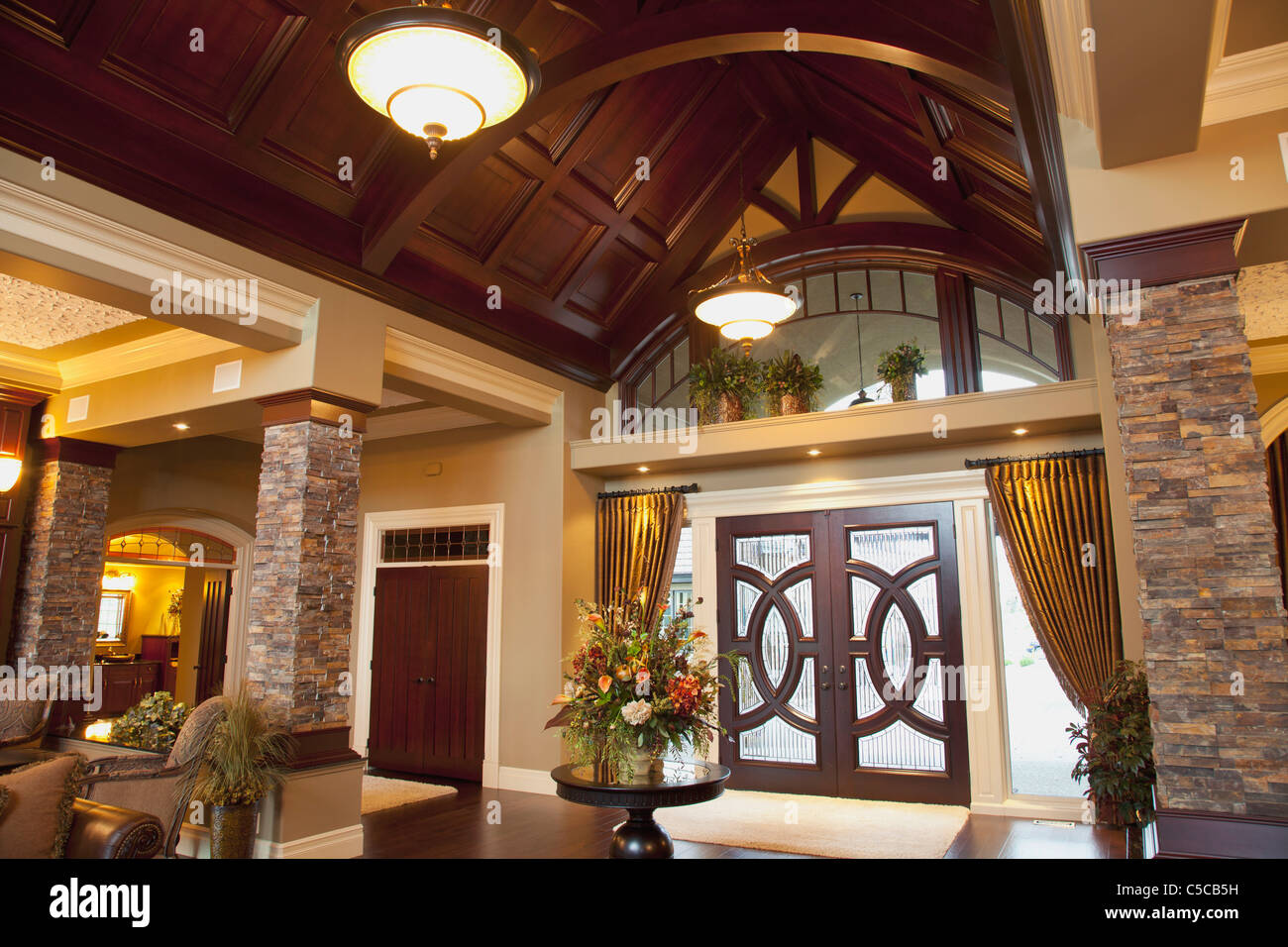 Front Entrance And Vaulted Ceiling In Luxurious Show Home; St. Albert