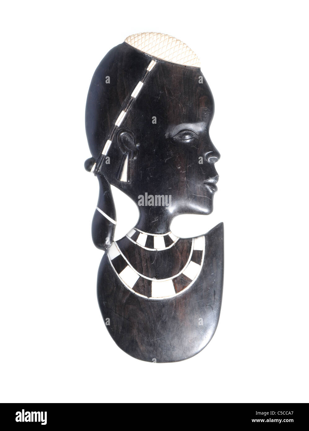 illegal endangered species product from CITES list - african mask with ivory elements Stock Photo