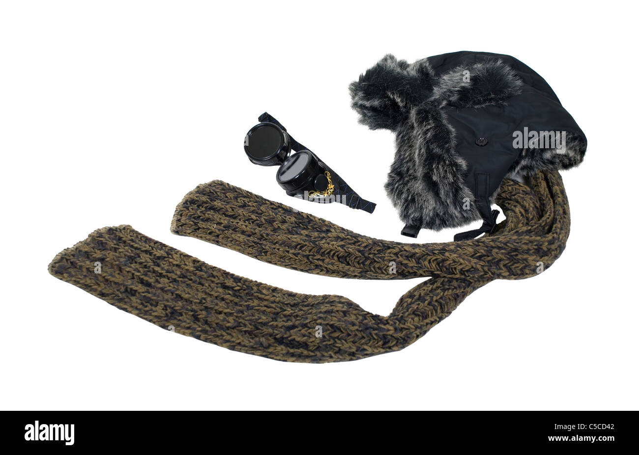 Cold weather steampunk aviator kit with fur hat, eye protecting goggles and scarf - path included Stock Photo