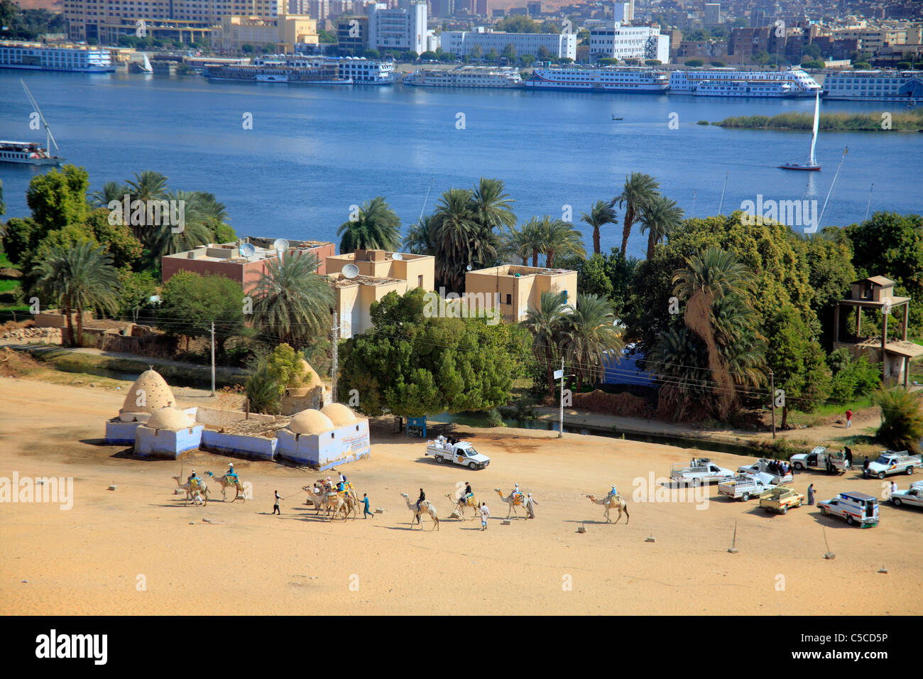 Vernacular Nubian mosque and river Nile, view from Qubbet al-Hawa rock, Aswan, Egypt Stock Photo