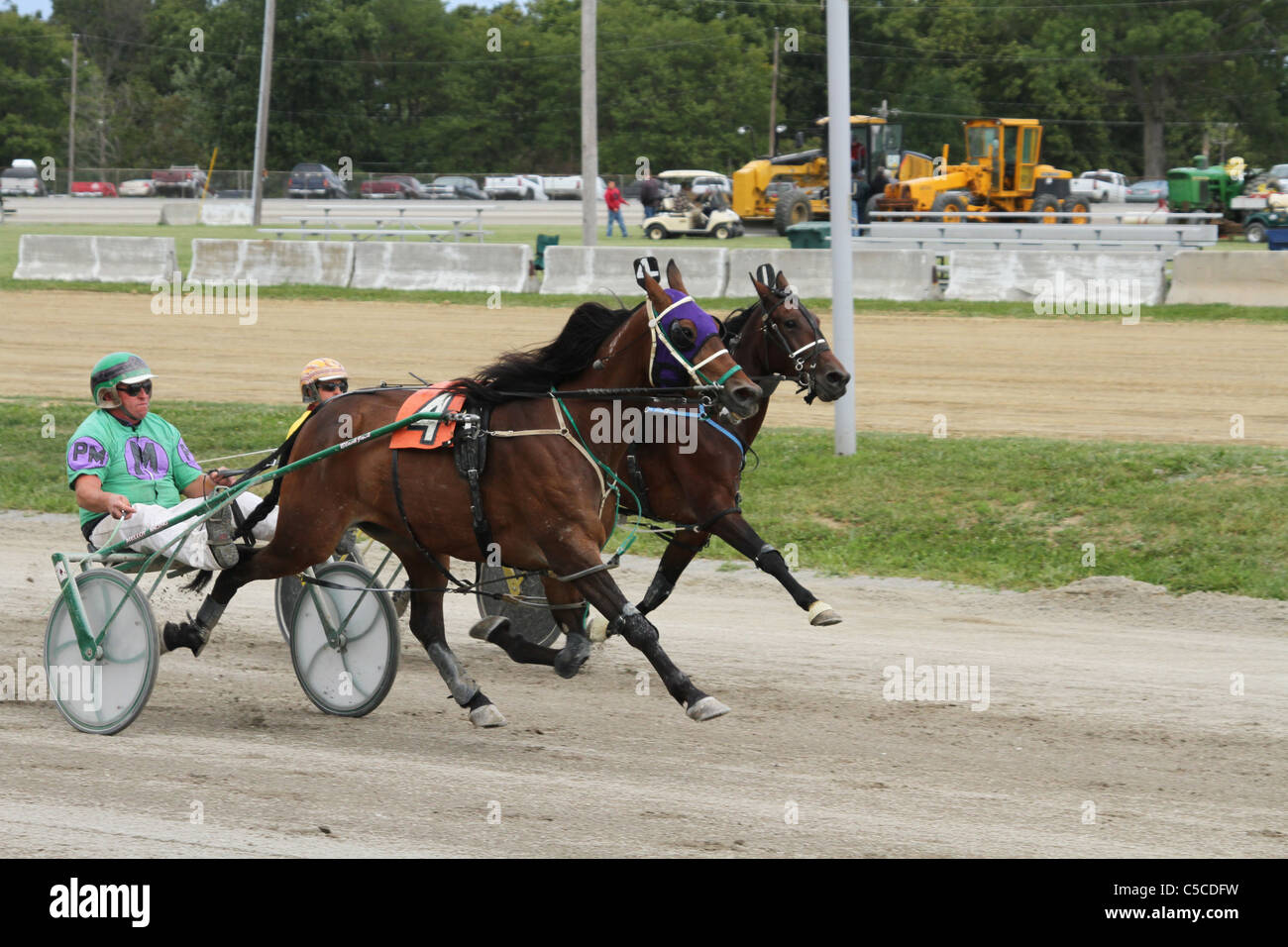 Harness Racing. Horse Racing. Canfield Fair. Mahoning County Fair. Canfield, Ohio, USA. Horses are in step. Stock Photo