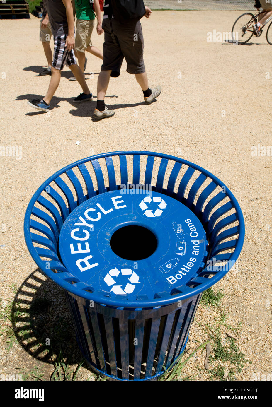 A blue recycle bin along a walking path Washington, DC USA Stock