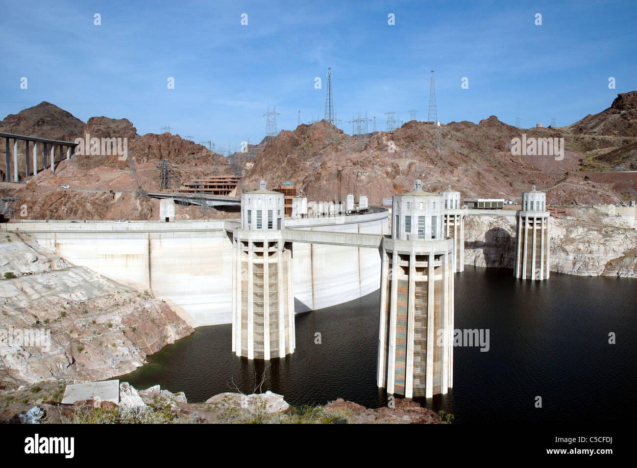Hoover Dam creates hydroelectric power and holds back the water of the