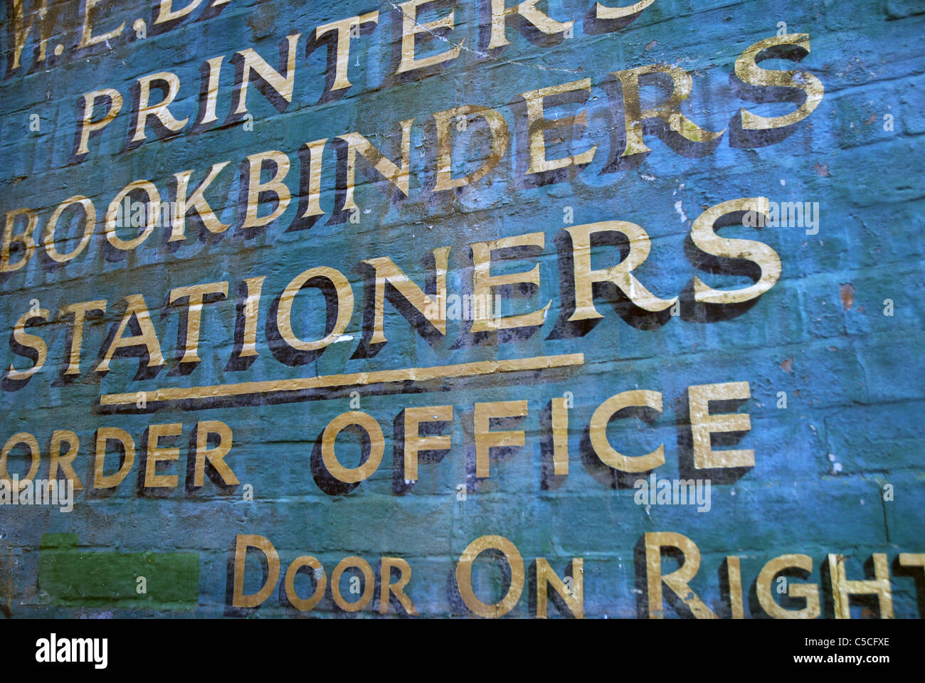 Painted Printers sign om  wall. Lewes, Sussex, GB. Stock Photo