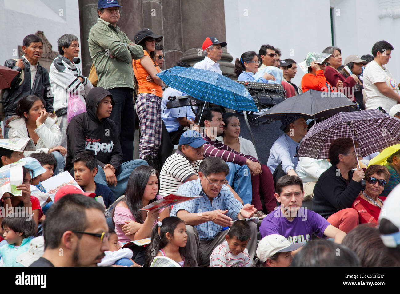 Crowds listening to an Independence Day concert in Plaza de la Independencia, Quito, Ecuador