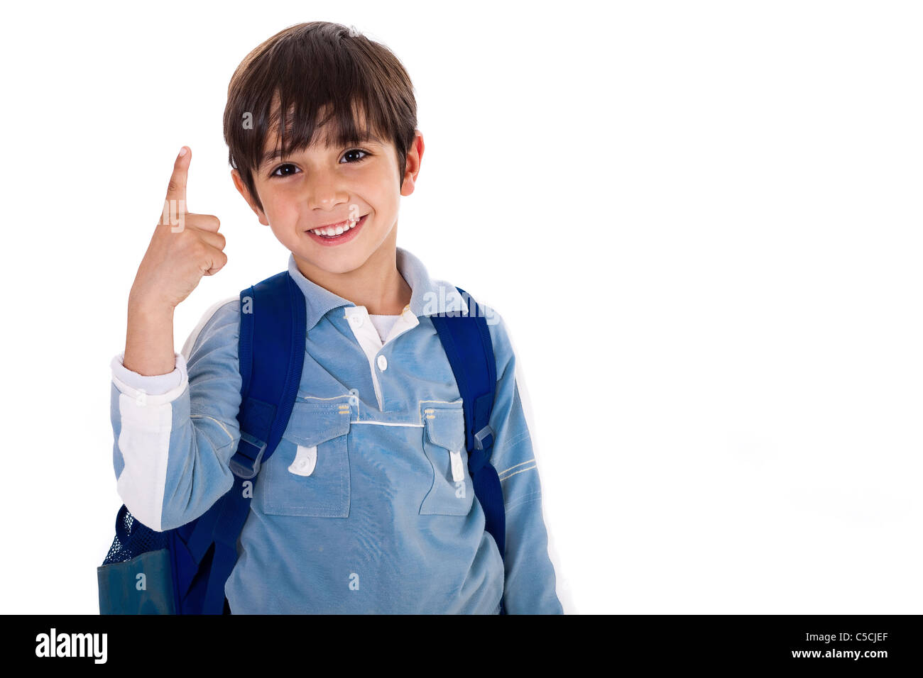 Young school boy with finger up on isolated white background Stock Photo