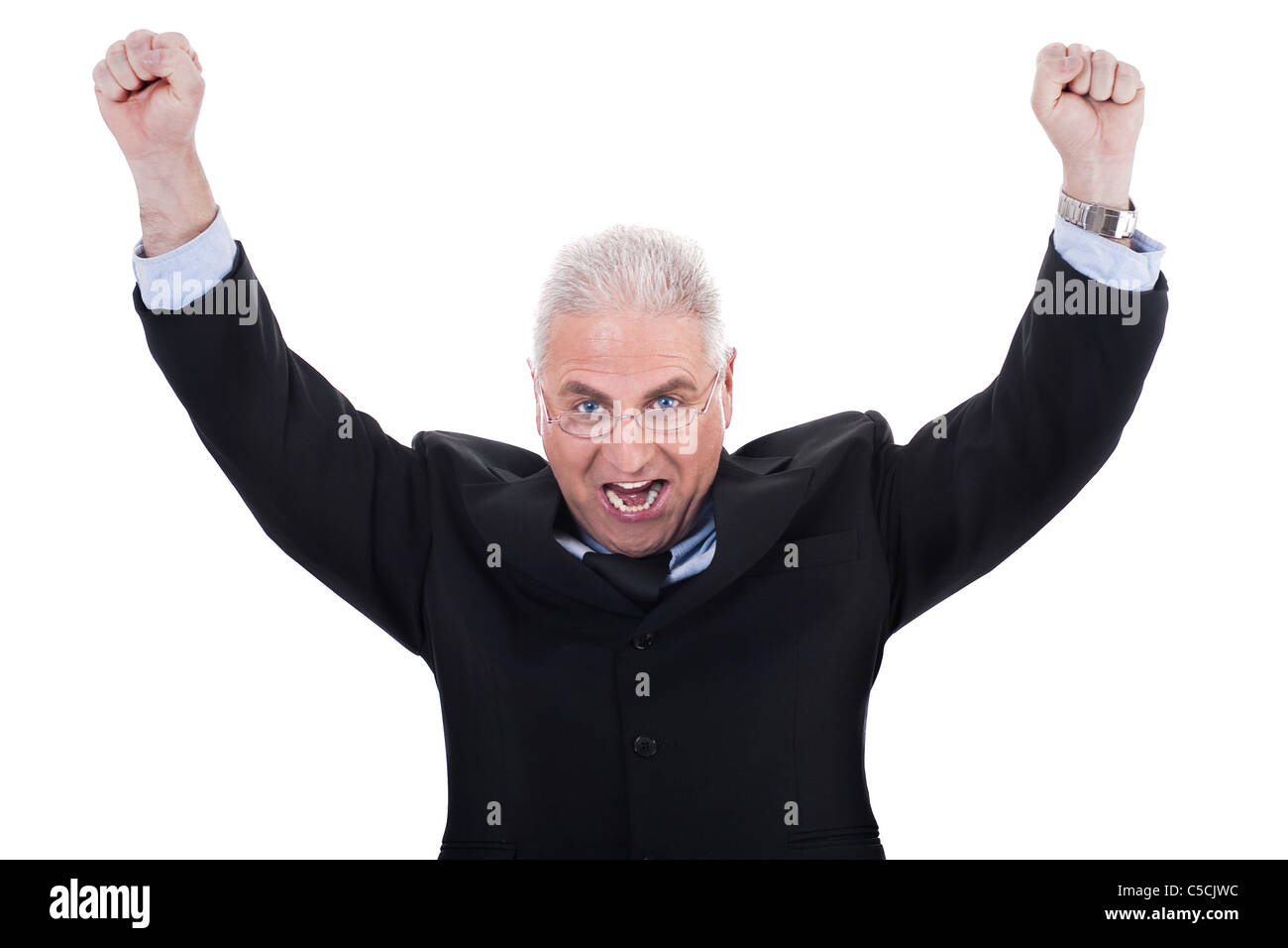 Champion senior business man standing with fists clenched in victory in white background Stock Photo