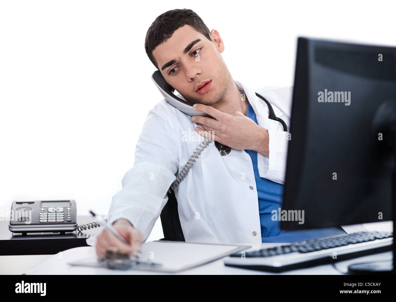 Doctor busy during duty time at his office Stock Photo