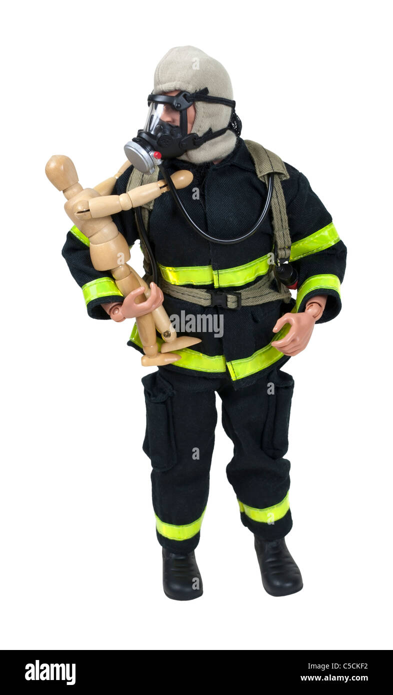 Fireman in protective gear used for fighting fires and saving lives holding a small child - path included Stock Photo