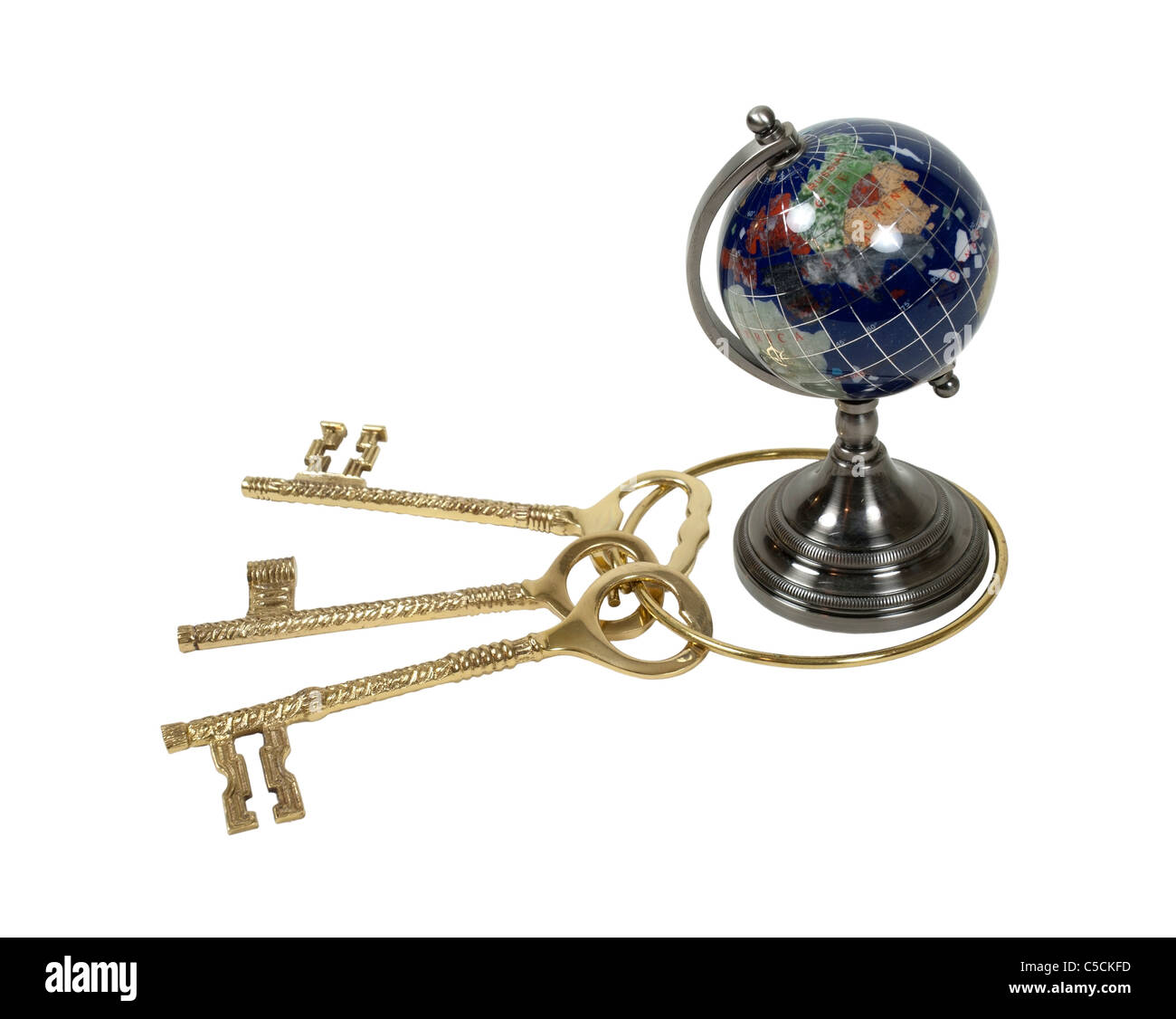 Keys to the world shown by golden keys with an inlaid globe of precious stones with basic navigation notations - path included Stock Photo