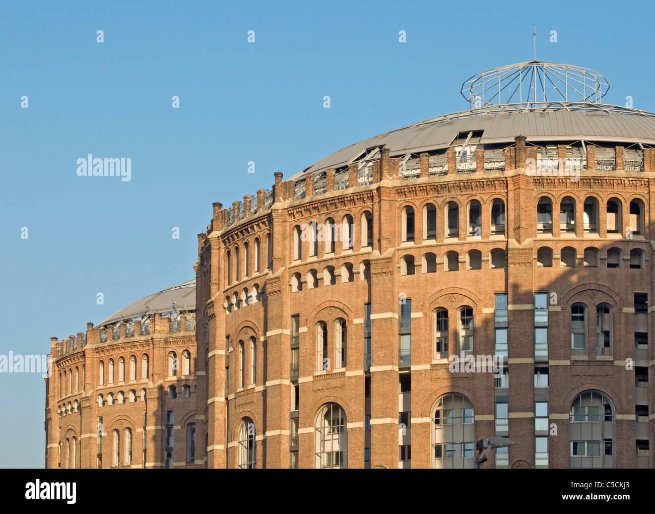 Red-brick Facades of Remodelled Buildings of Gasometers A and B (Former Gas Tanks) in Simmering, Vienna (Wien), Austria Stock Photo