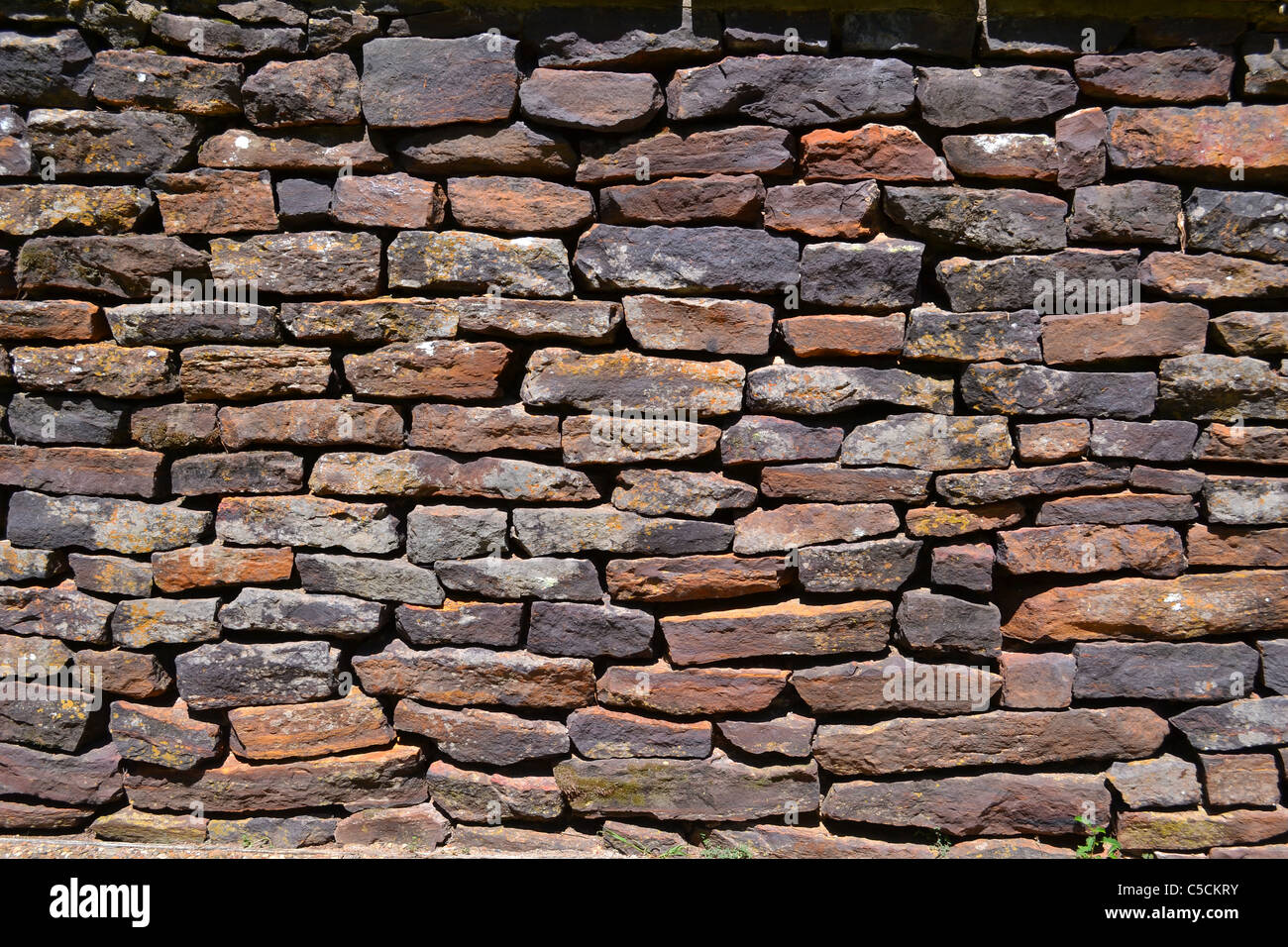 Old stone wall that makes a great background or texture Stock Photo - Alamy