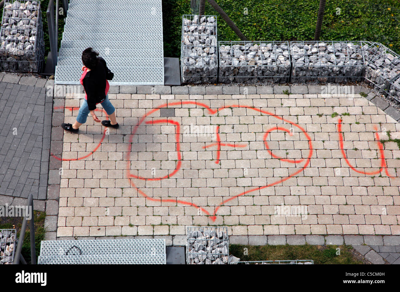 Declaration of love has been sprayed on a walkway. Stock Photo