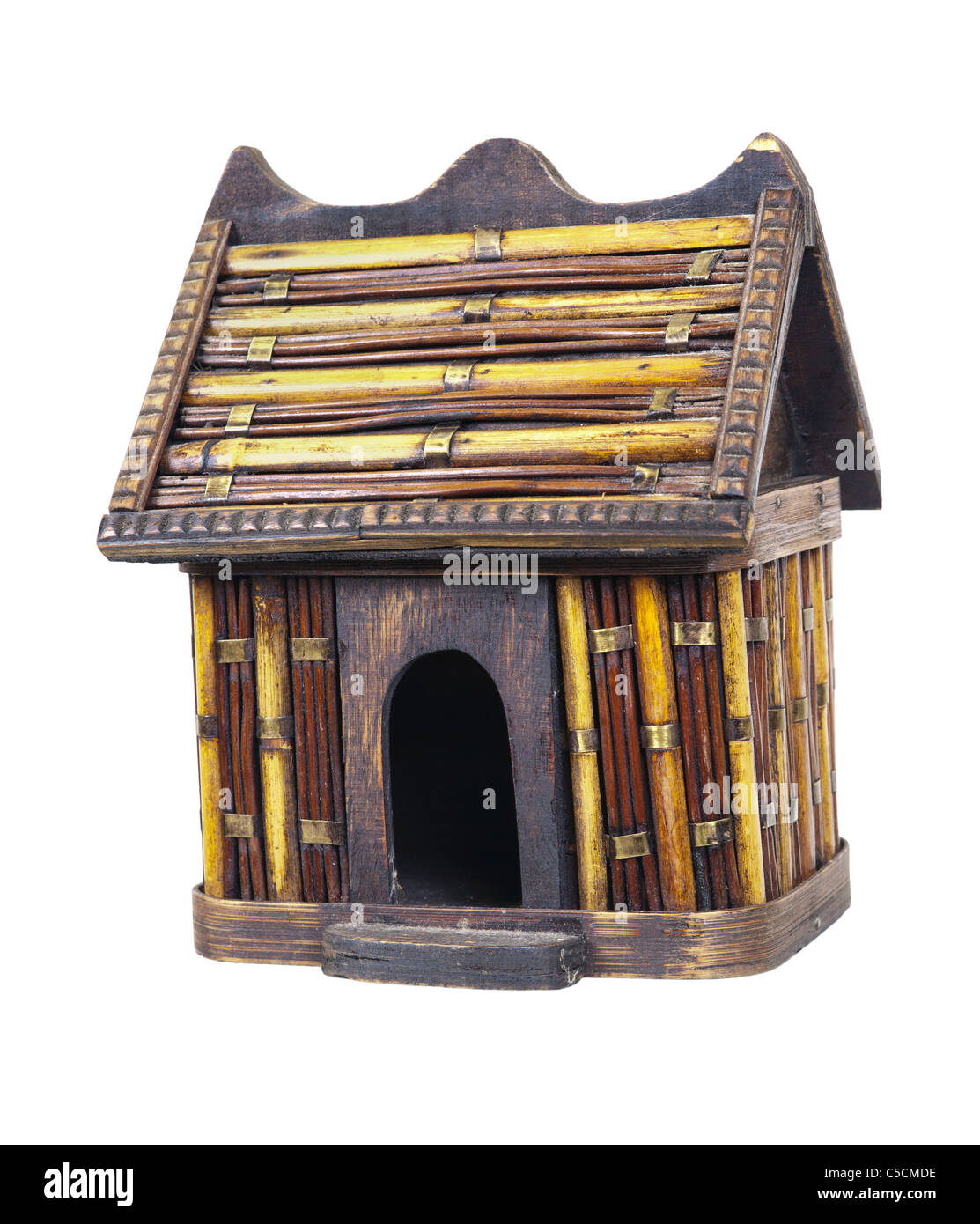 Rustic bamboo birdhouse for blending in with the neighbors - path included Stock Photo