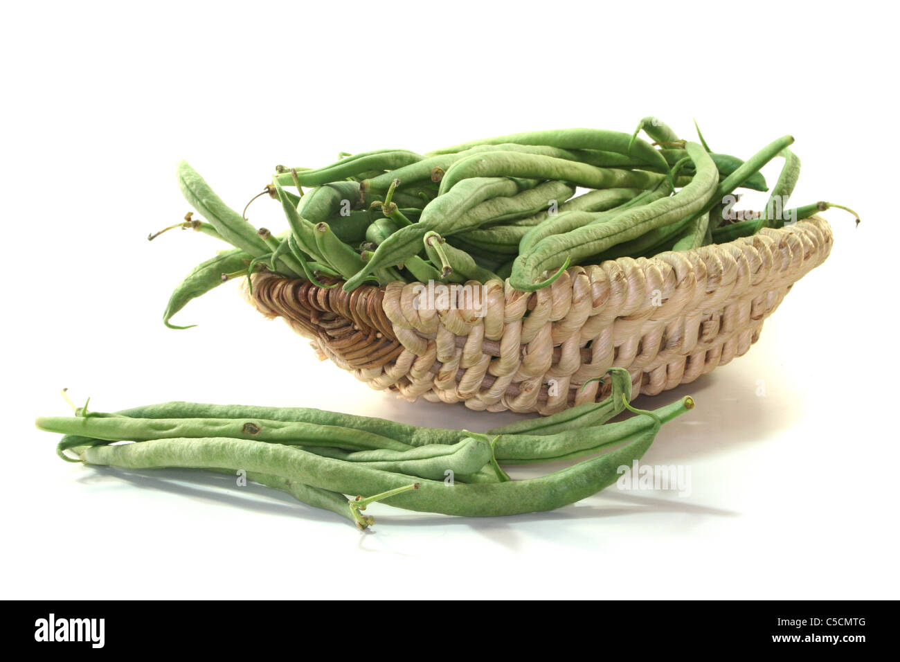 a lot of green beans in a basket Stock Photo Alamy