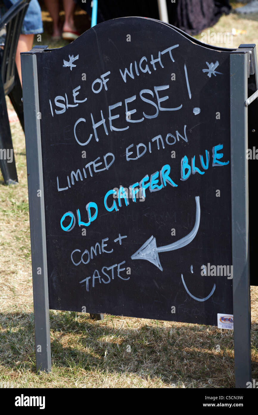 blackboard advertising Isle of Wight Cheese Limited edition Old Gaffer Blue at the Old Gaffer festival, Yarmouth, Isle of Wight, Hampshire UK in June Stock Photo