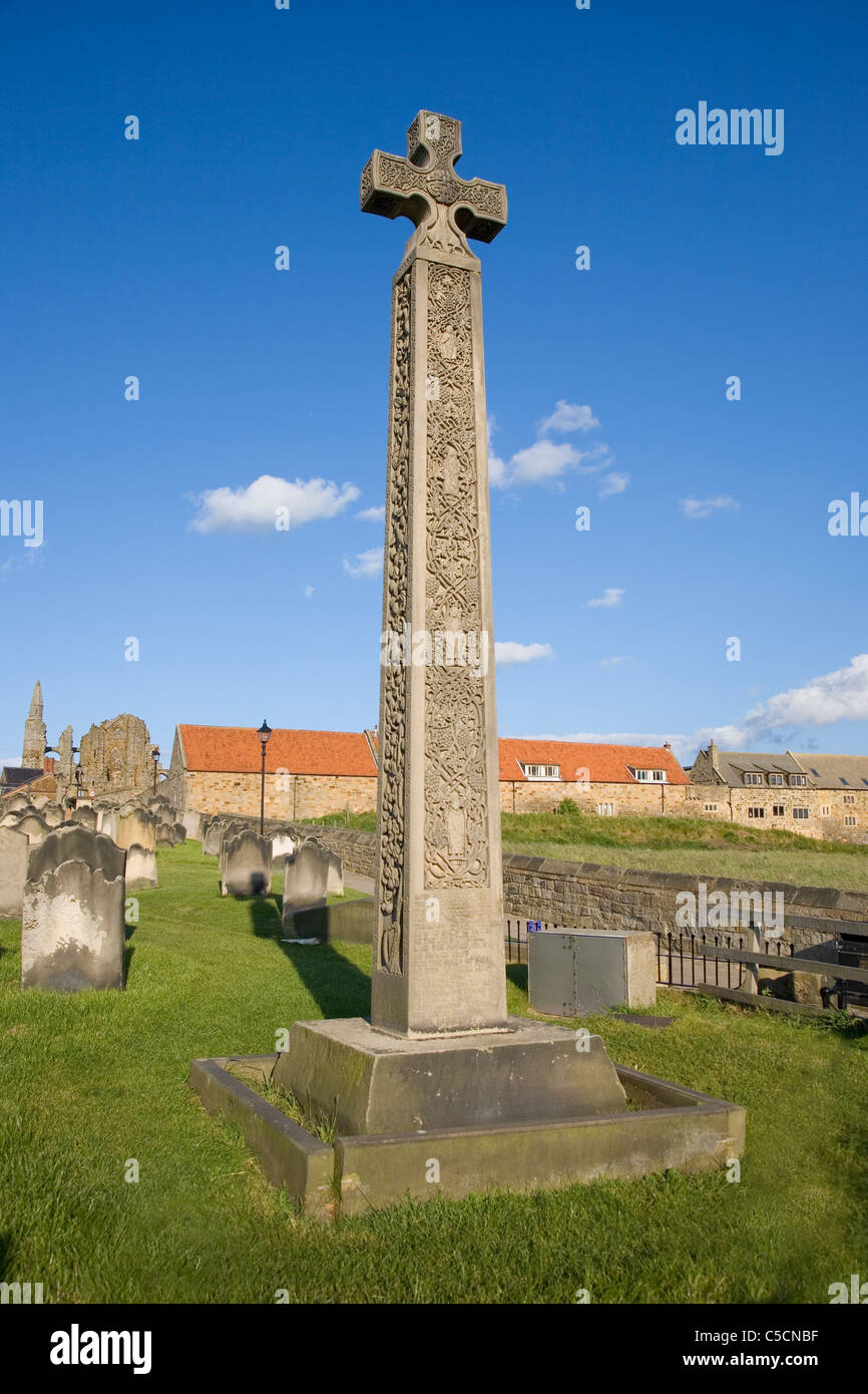 Caedmons cross in St Marys Church graveyard erected 1898 to commemorate Caedmon the first English poet Whitby North Yorkshire UK Stock Photo