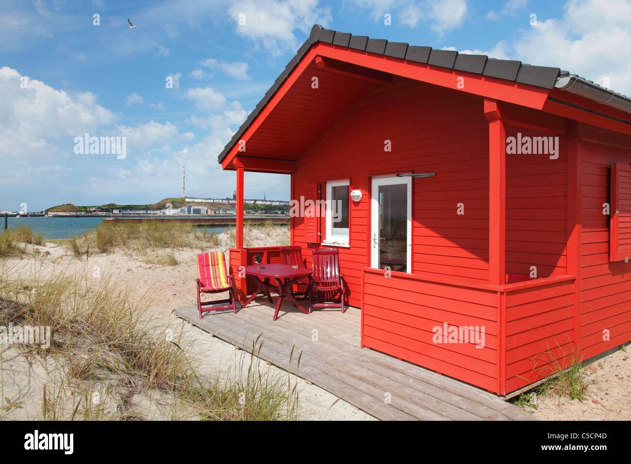 colourful bungalows used as holiday homes on the small Island 'The Dune' (Die Düne) opposite to Helgoland Stock Photo