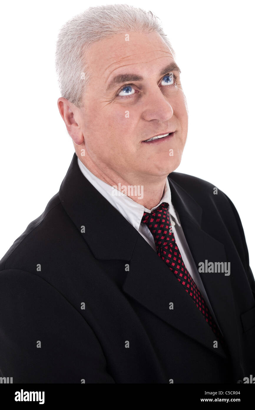 Portrait of thinking senior, business man on isolated background Stock Photo