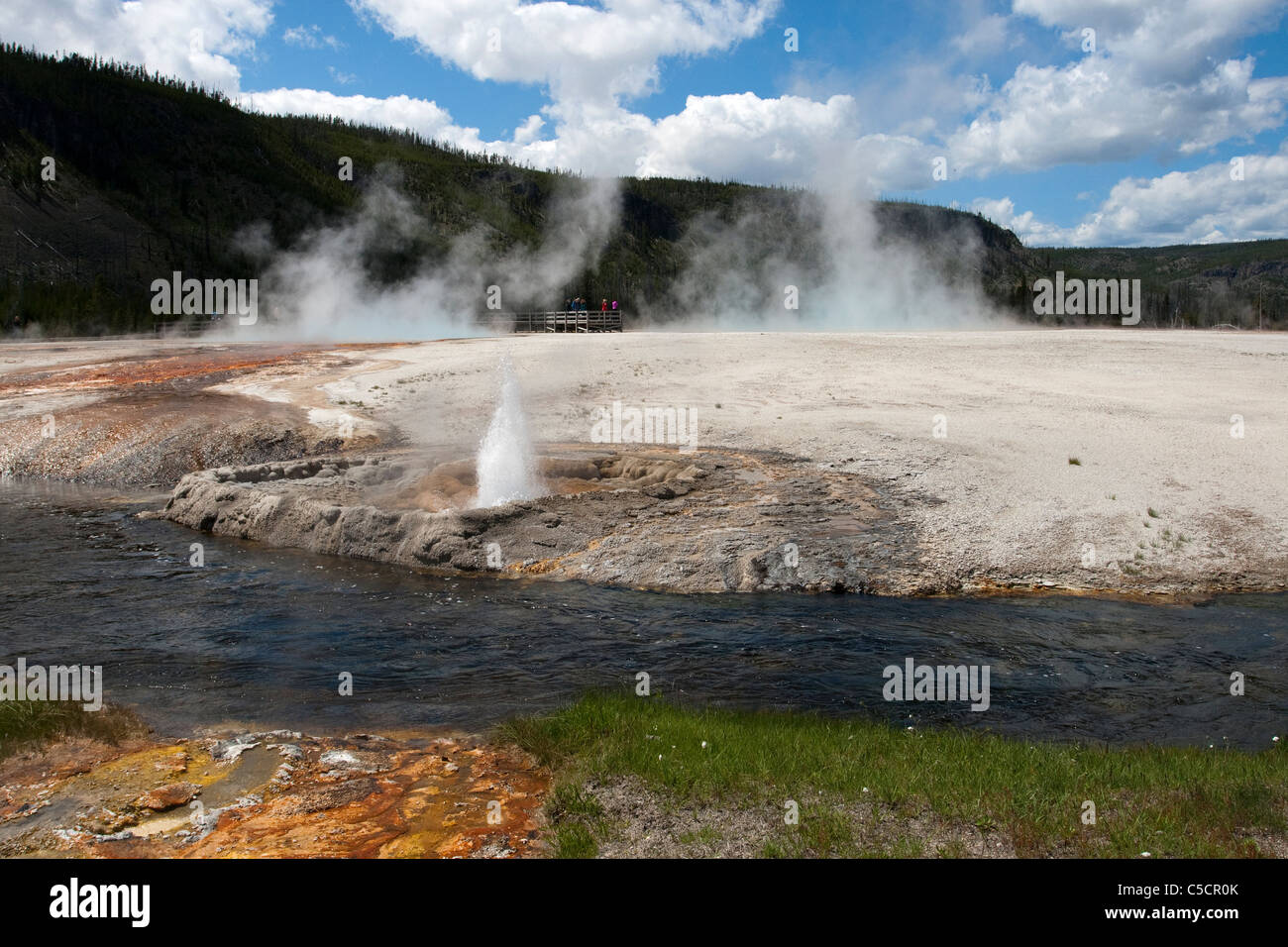 Cliff geyser erupting Stock Photo