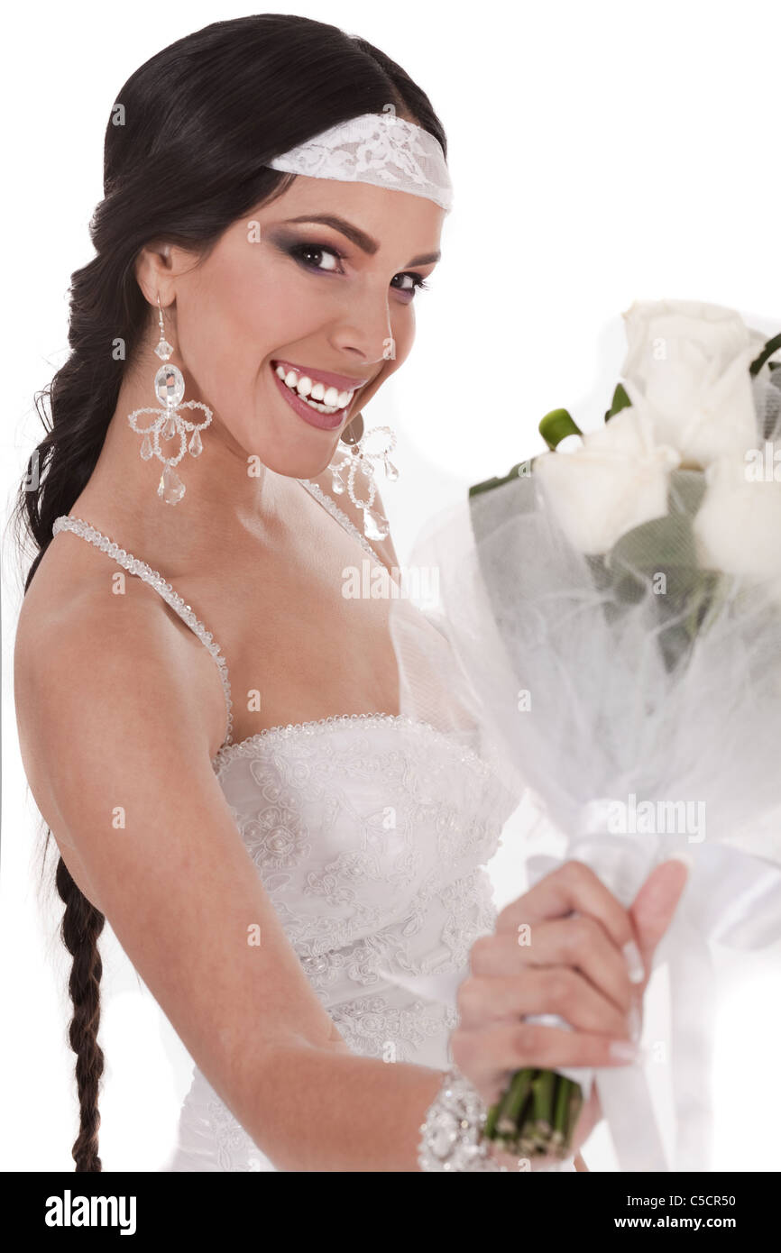 Bride with wedding bouquet over white background Stock Photo