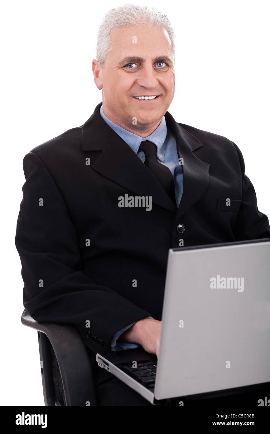 Mature business man working in notebook on white background Stock Photo