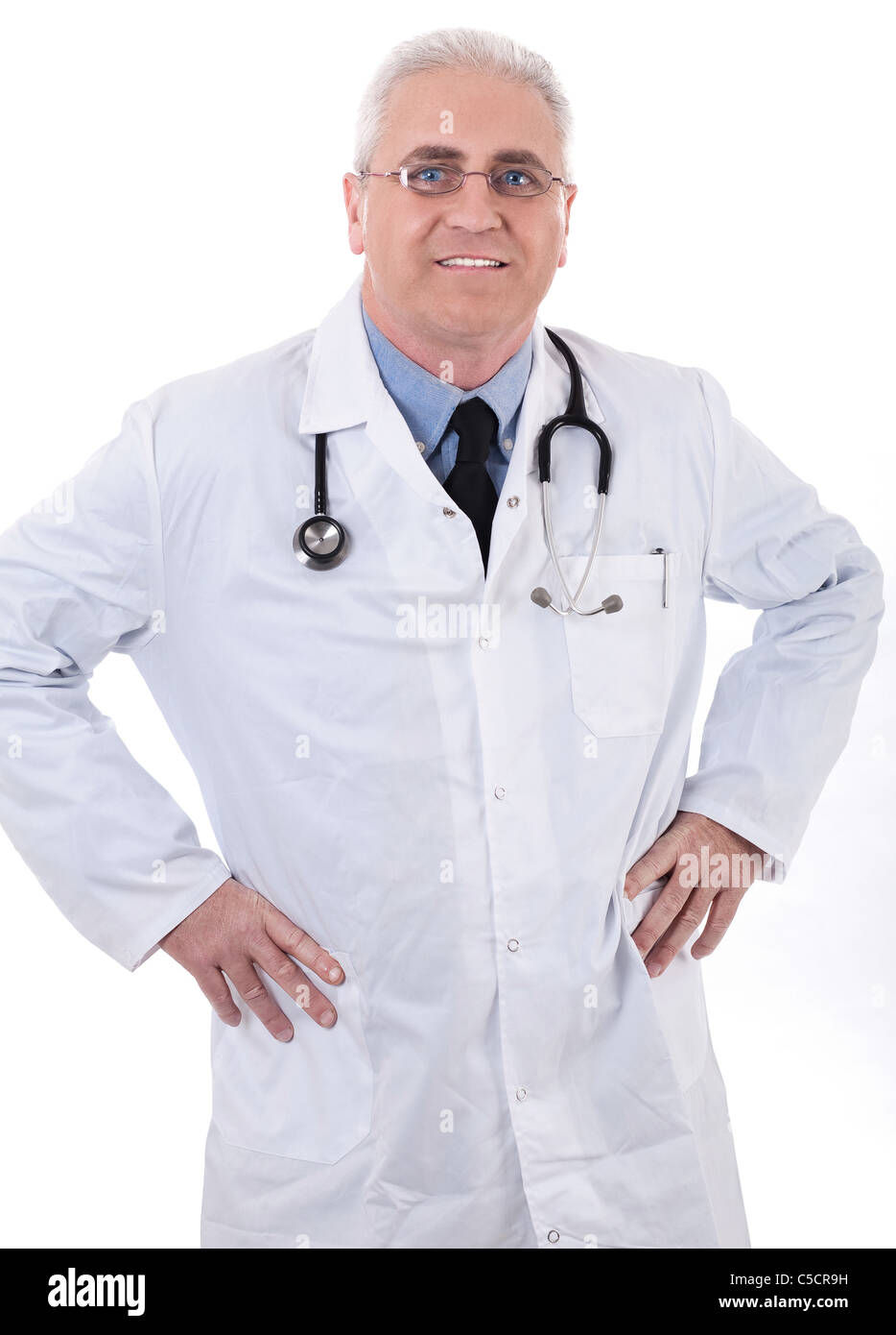Smiling medical doctor with stethoscope in white background Stock Photo