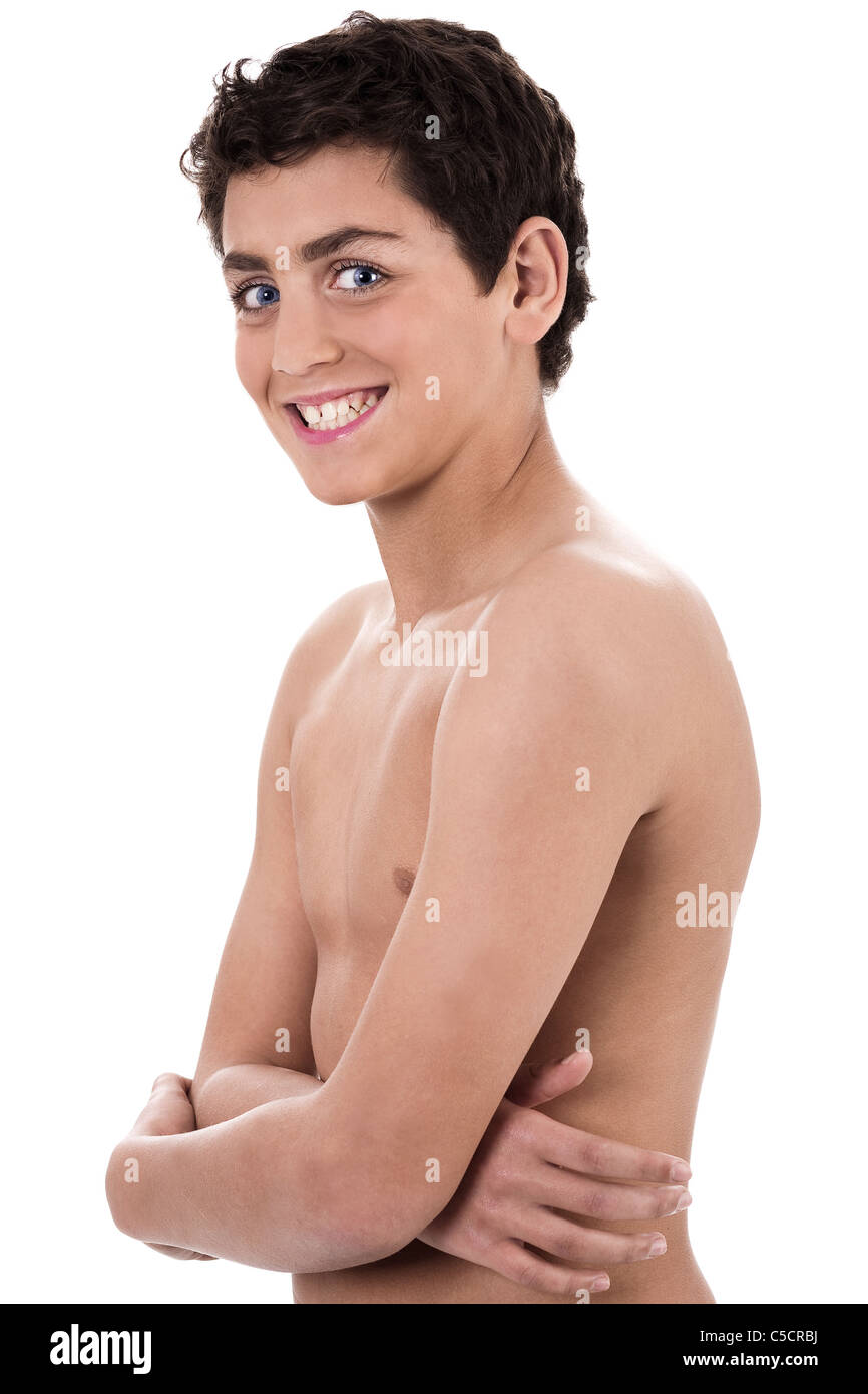Boy giving strange expression and smiling isolated on white background Stock Photo