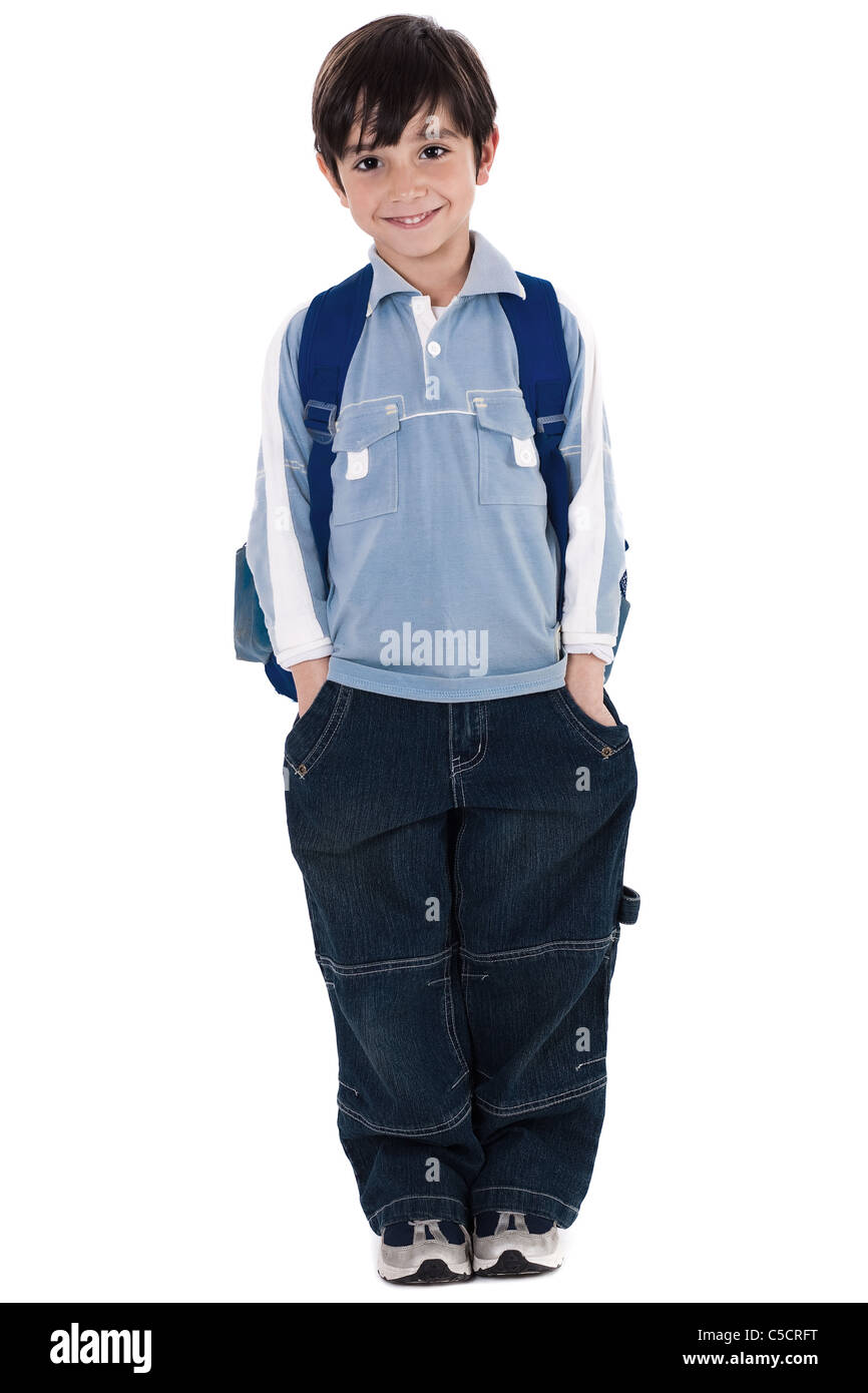 young school boy standing in white isolated background Stock Photo - Alamy