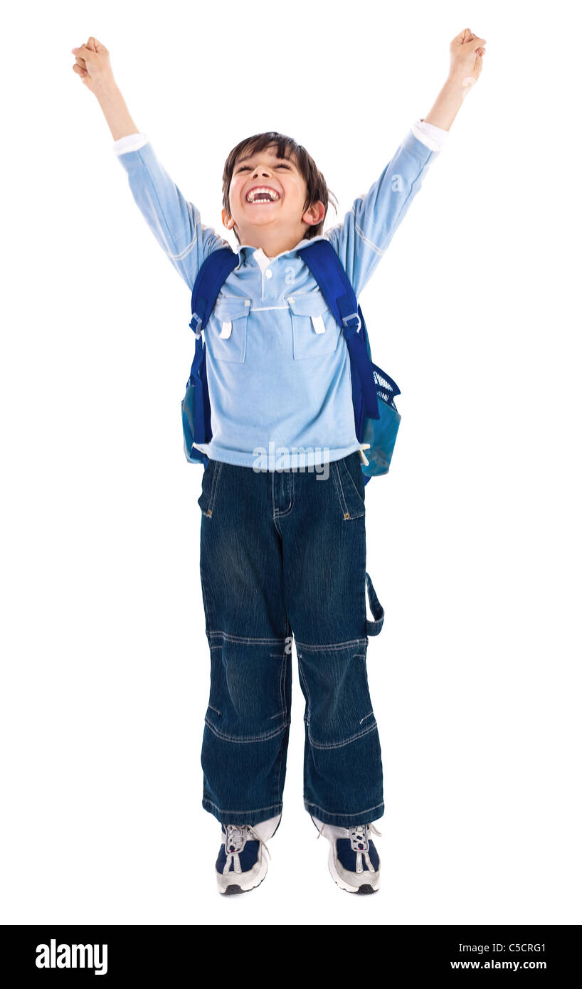 school boy raising his hands up wearing school bag on isolated background Stock Photo