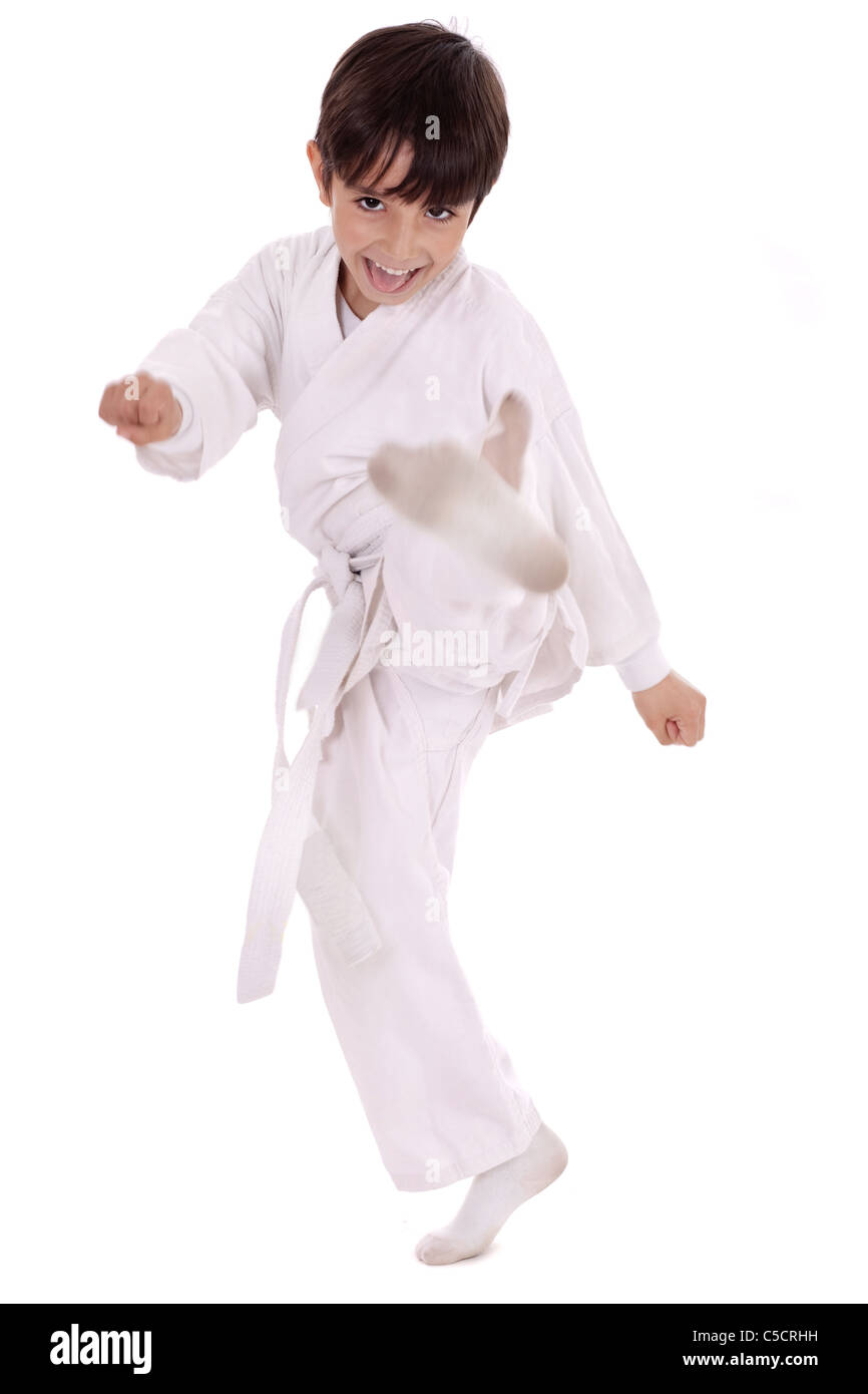 Karate boy exercising isolated white background Stock Photo