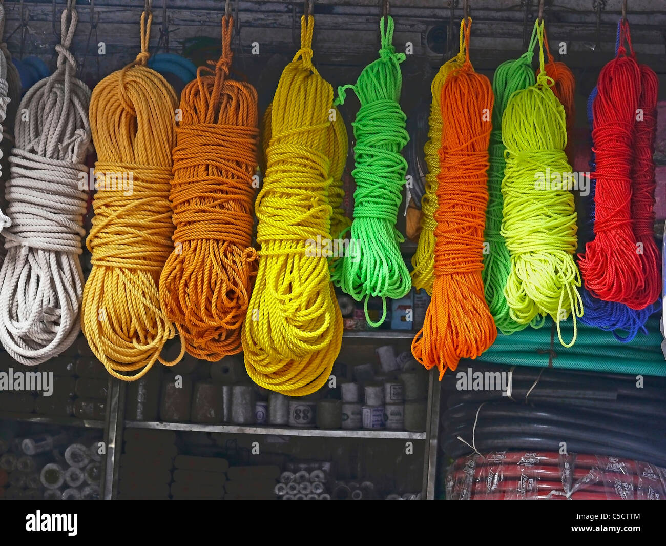 Bundles of Nylon heavy-duty commercial quality rope are displayed outside a  shop for sell, India Stock Photo - Alamy