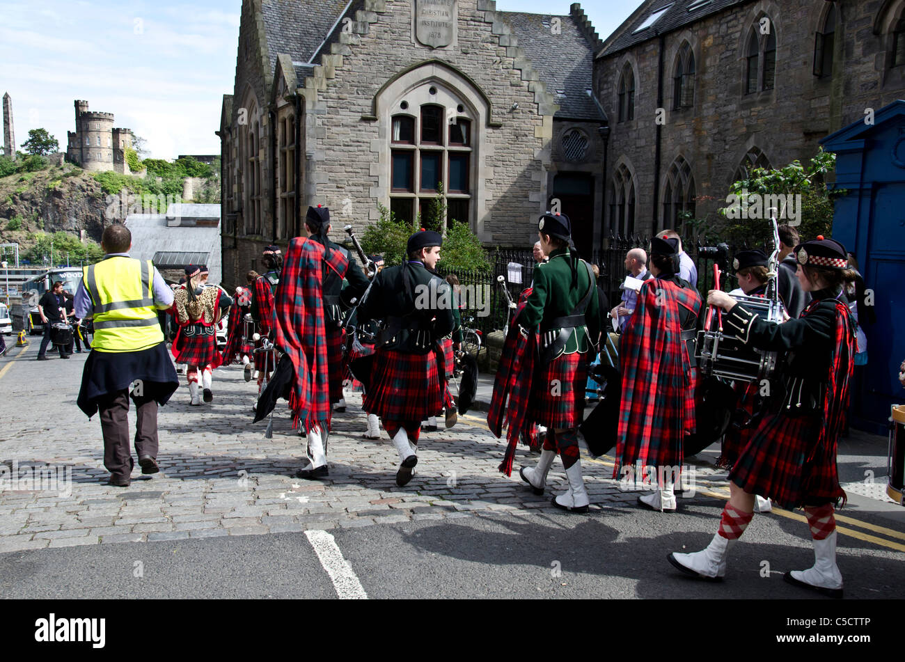 Pipe band waiting prior to a parade down Edinburgh's Royal Mile Stock