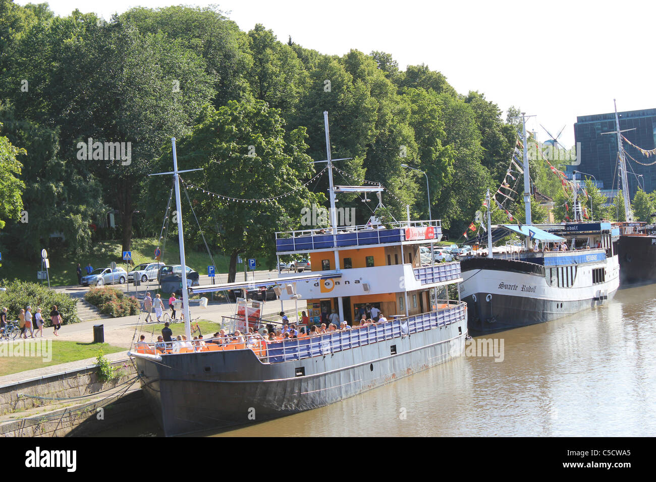 Restaurant boats by Aura river (Aurajoki) in Turku, Finland Stock Photo