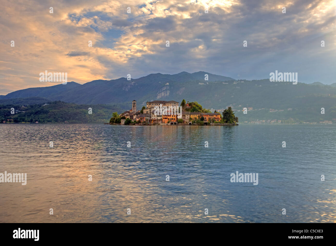 the island of San Giulio on Lake Orta in the evening sun Stock Photo