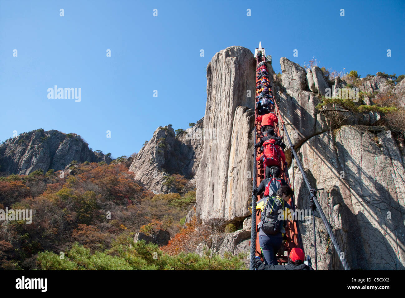 climbers hiking rocks Stock Photo
