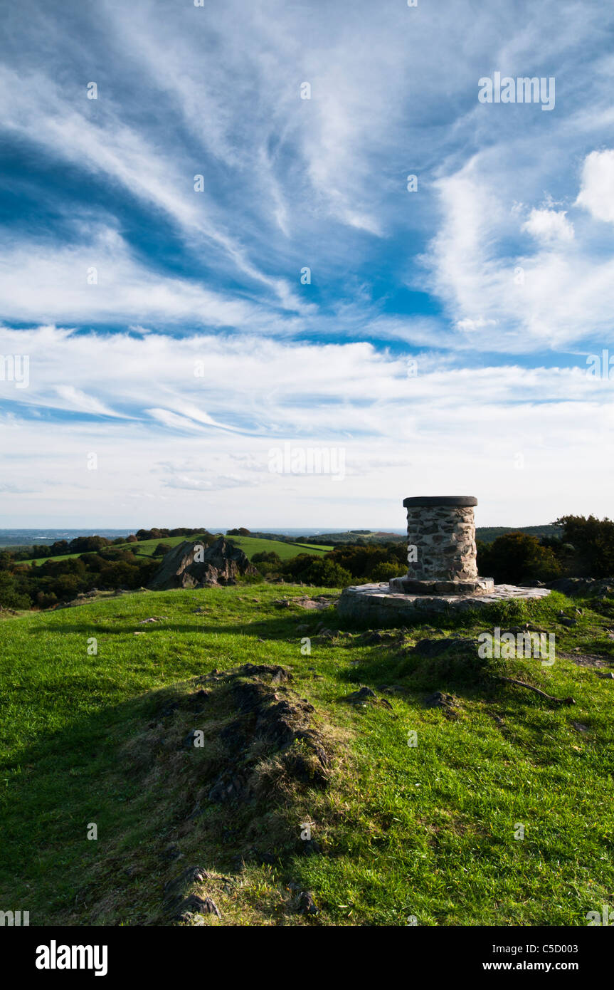 Beside a topograph and ancient volcanic rocks on top of Beacon Hill looking south-east towards Bradgate Park, Leicestershire, England Stock Photo