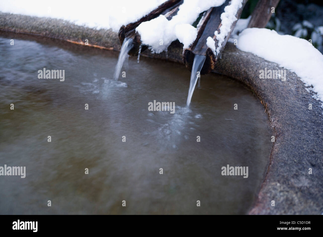 mineral water pouring out from the source Stock Photo Alamy