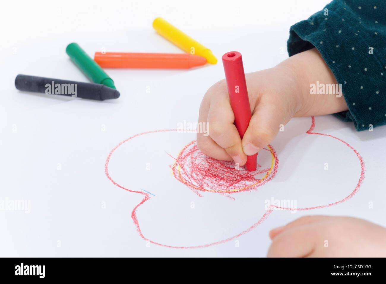 girl drawing picture by using crayon Stock Photo - Alamy