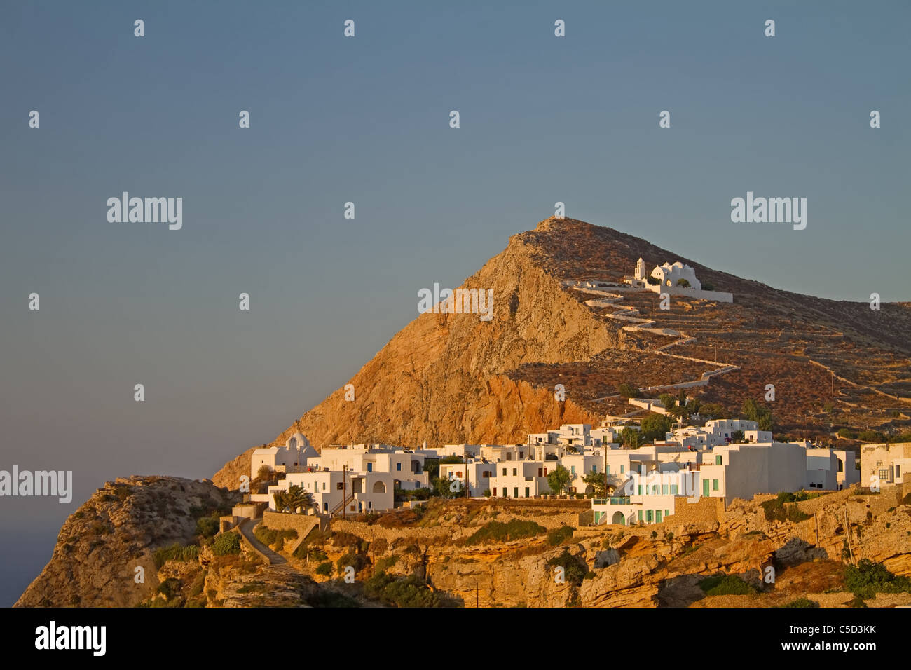 The picturesque town of Chora on Folegandros island, Greece, at sunset ...