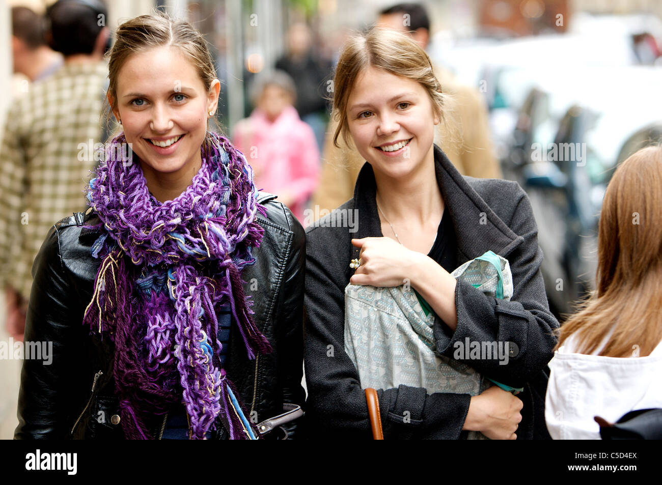 Two girls walking dark hi-res stock photography and images - Alamy
