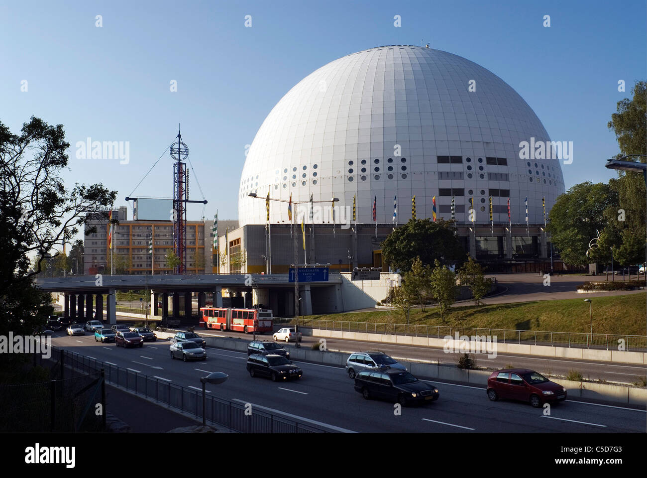The globe against clear blue sky with urban road in the foreground at Stockholm, Sweden Stock Photo
