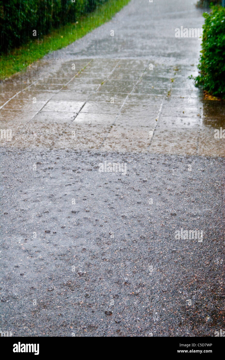 Rain dripping on asphalt hires stock photography and images Alamy