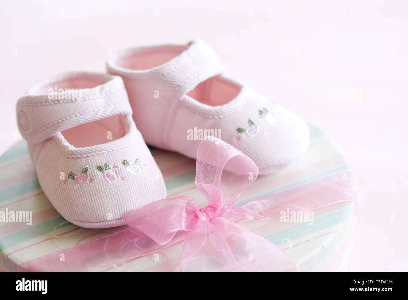 Pink baby shoes Stock Photo - Alamy