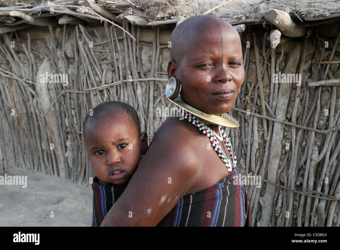 TANZANIA Watatulu tribes people of Miyuguyu, Shinyanga district. Woman with baby. photograph by Sean Sprague Stock Photo