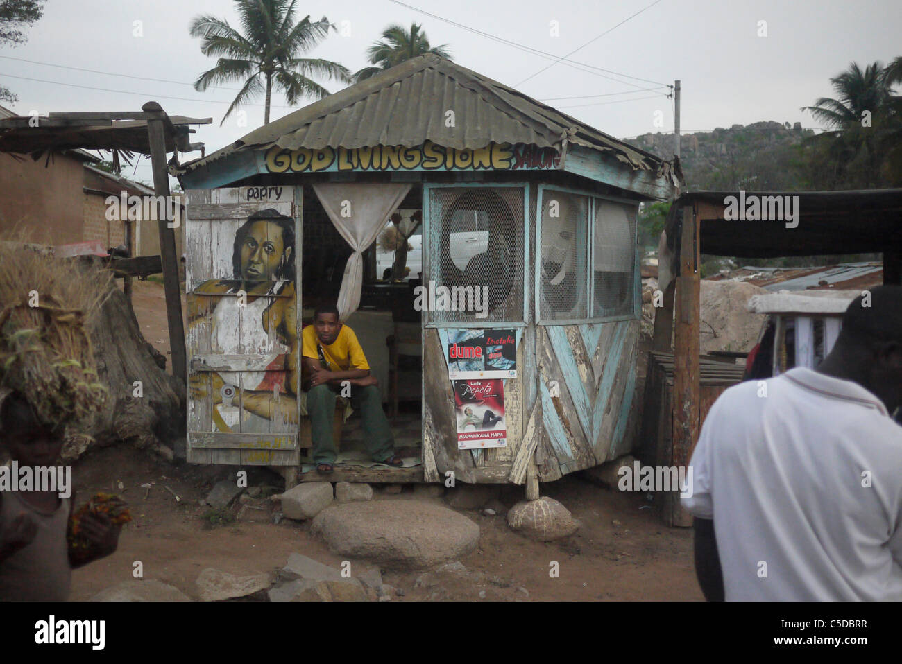 TANZANIA Street scenes in Mabatini, Mwanza. Small barners shop. photograph by Sean Sprague Stock Photo