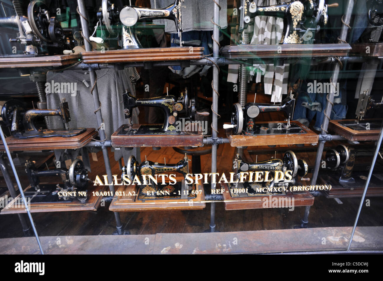 Close up of AllSaints shop in Brighton the window filled with old