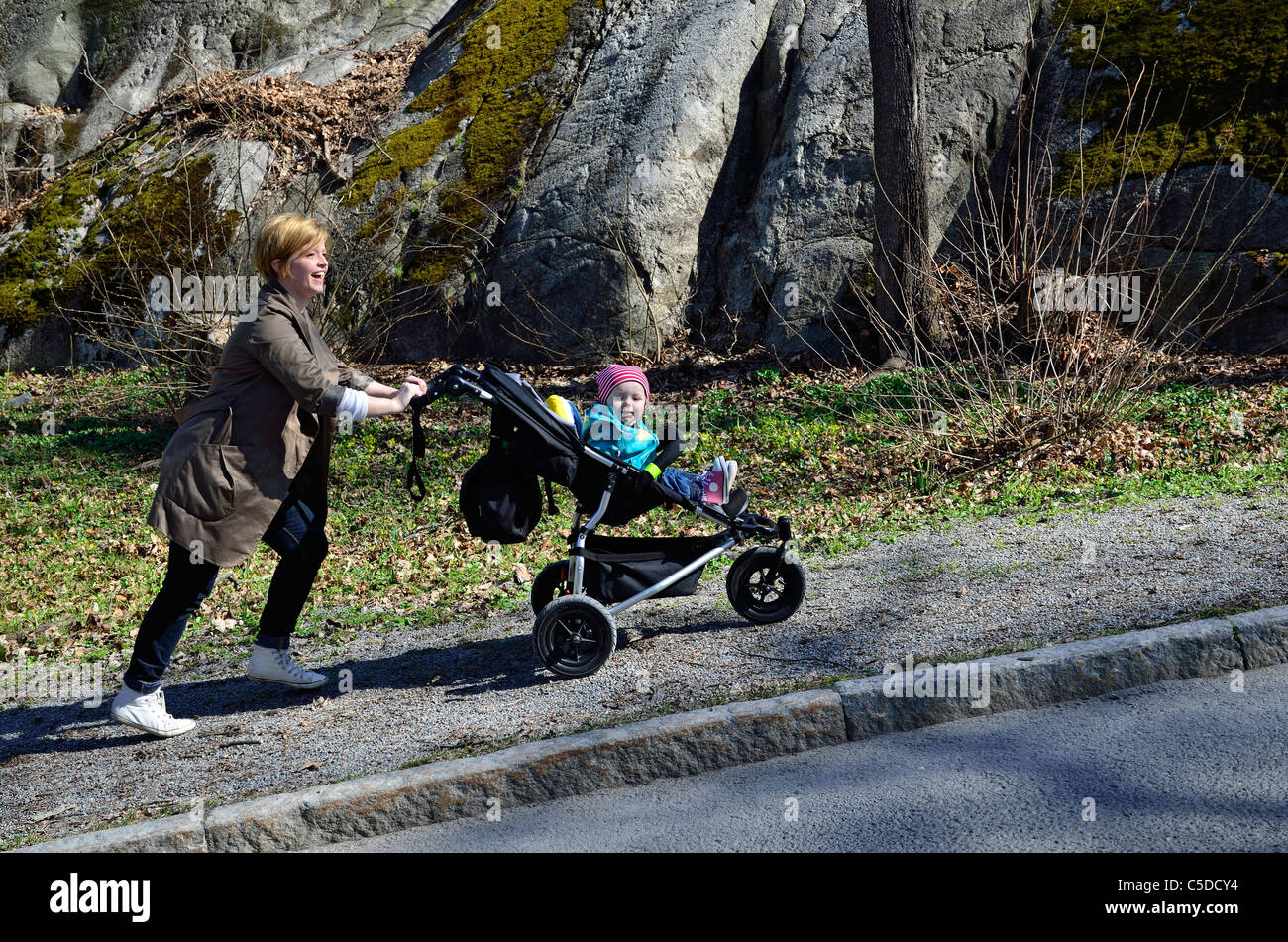 Adult baby in a pram hires stock photography and images Alamy